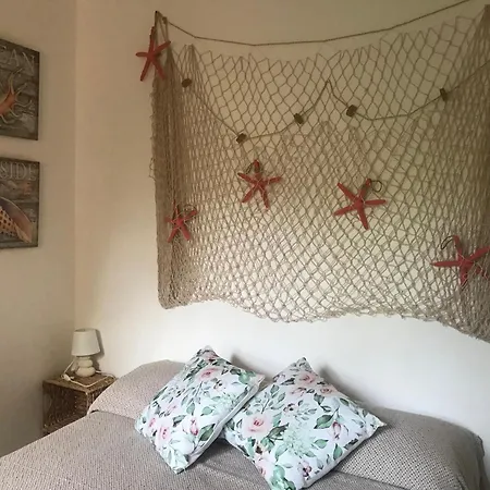 Bella Casa Al Mare Calarossa דירה איזולה רוסה